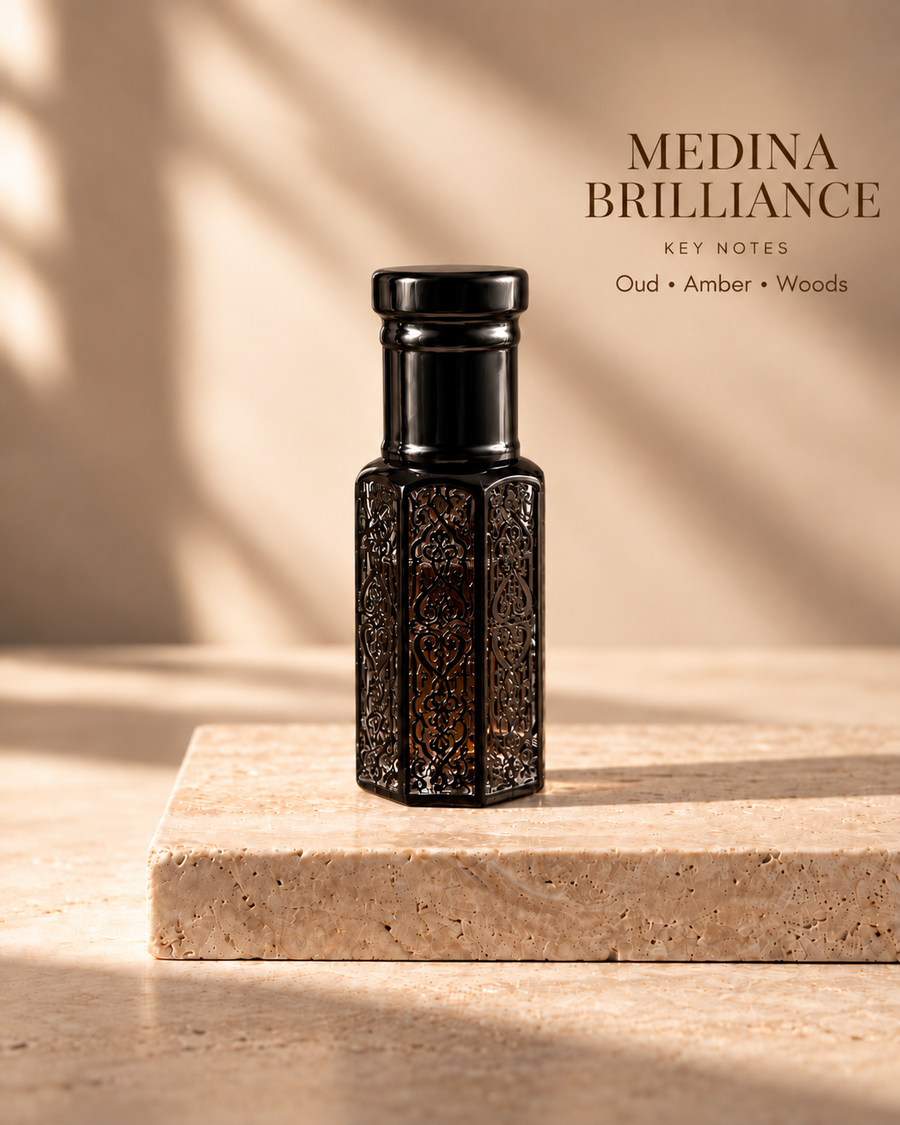 Medina Brilliance black oil rub bottle with key notes Oud, Amber, Woods