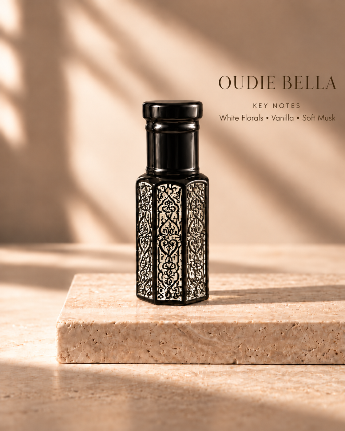 OUDIE Bella black oil rub bottle with key notes White Florals, Vanilla, Soft Musk
