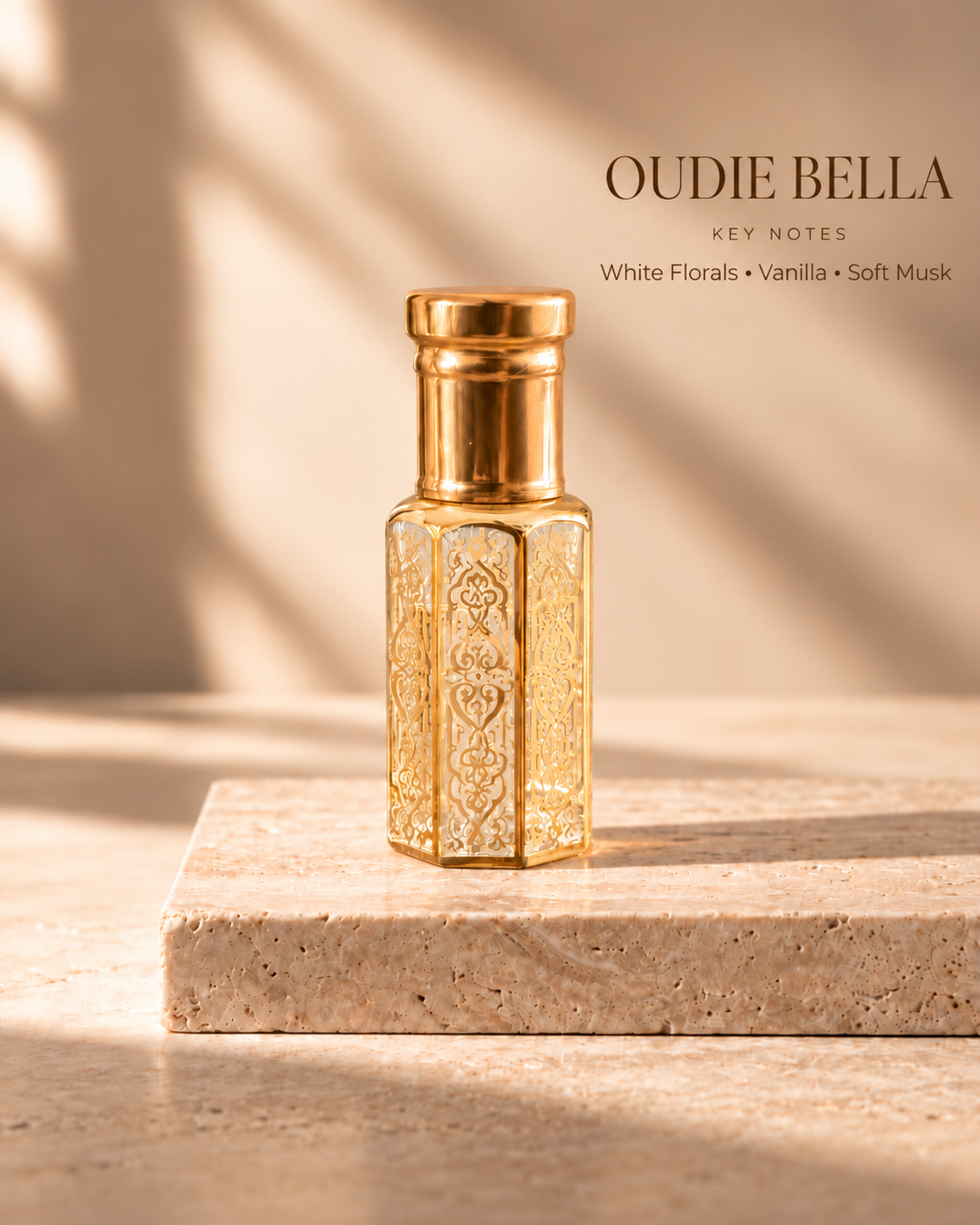 OUDIE Bella gold oil rub bottle with key notes White Florals, Vanilla, Soft Musk