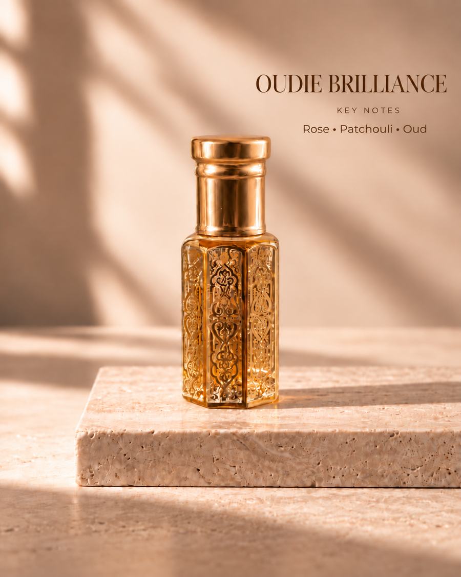 OUDIE Brilliance gold oil rub bottle with key notes Rose, Patchouli, Oud