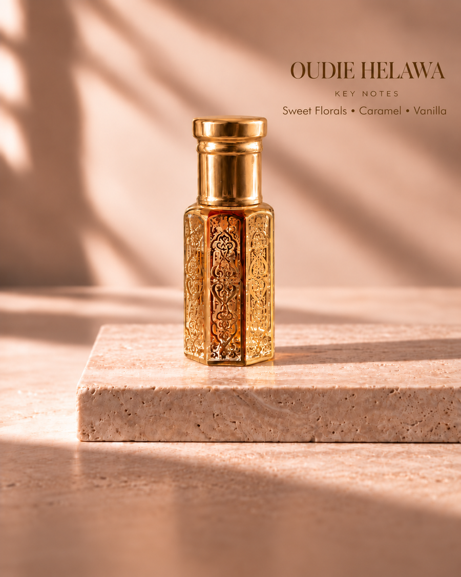 OUDIE Helawa gold oil rub bottle with key notes Sweet Florals, Caramel, Vanilla