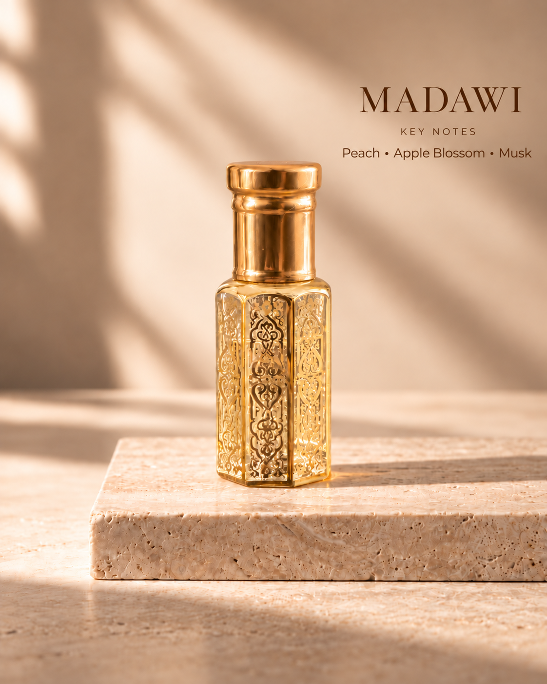 OUDIE Madawi gold oil rub bottle with key notes Peach, Apple Blossom, Musk